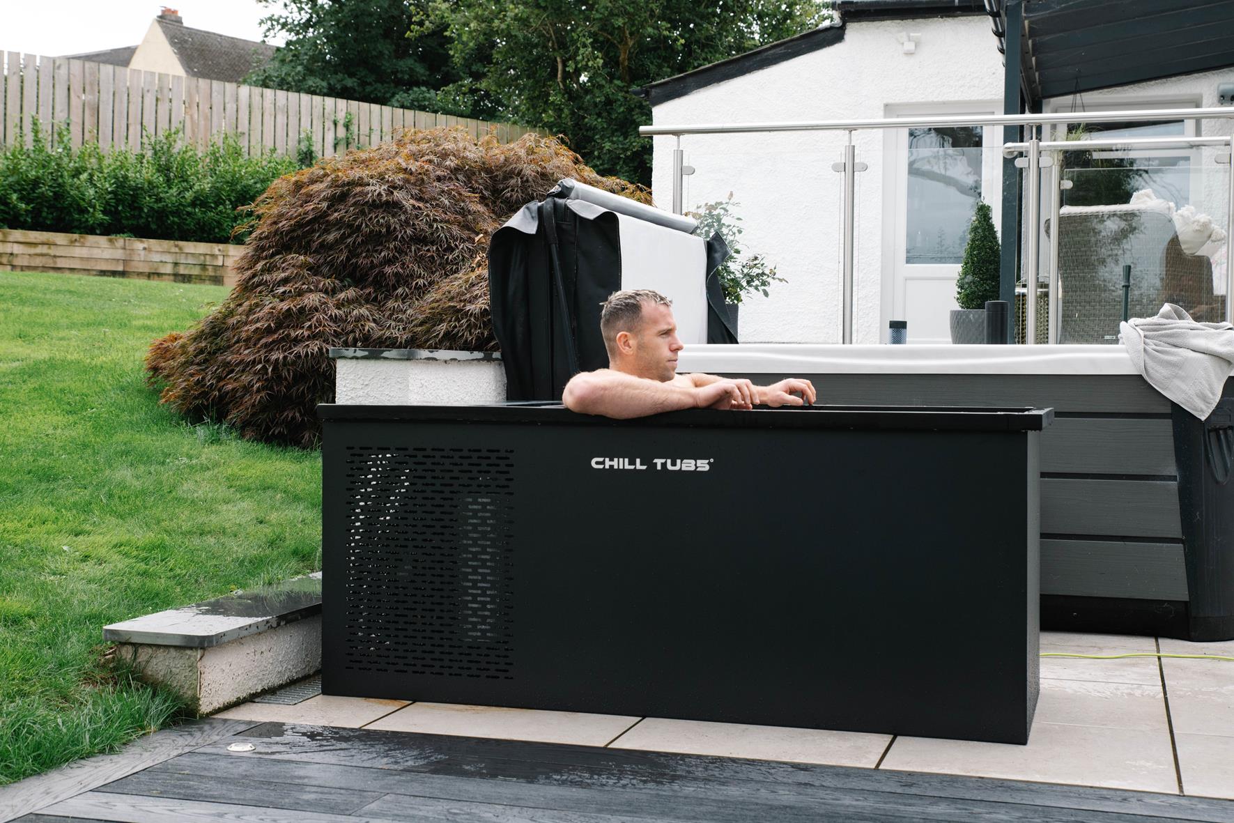 Wales international rugby union player Gareth Davies sat in the original chill tub